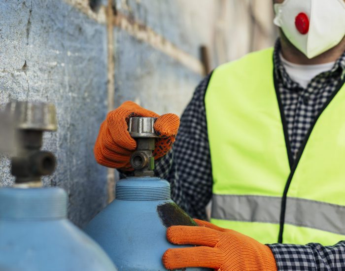 front-view-worker-with-protective-mask-gloves